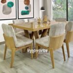 Comedor de madera natural con base en troncos, creando un estilo rústico y acogedor